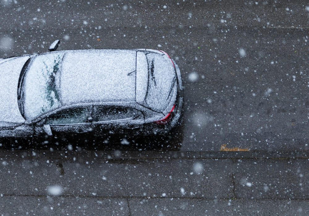 black-car-road-snow-new