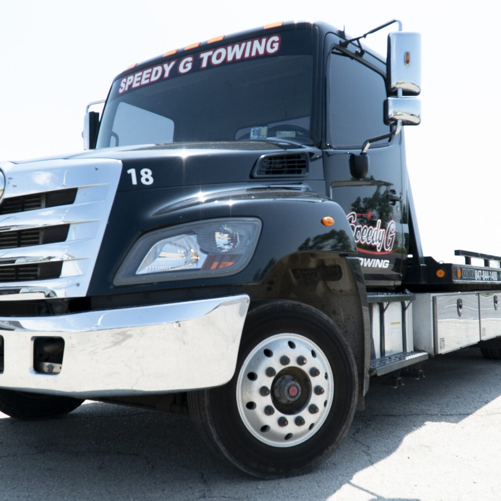 flatbed towing, low clearance tow truck