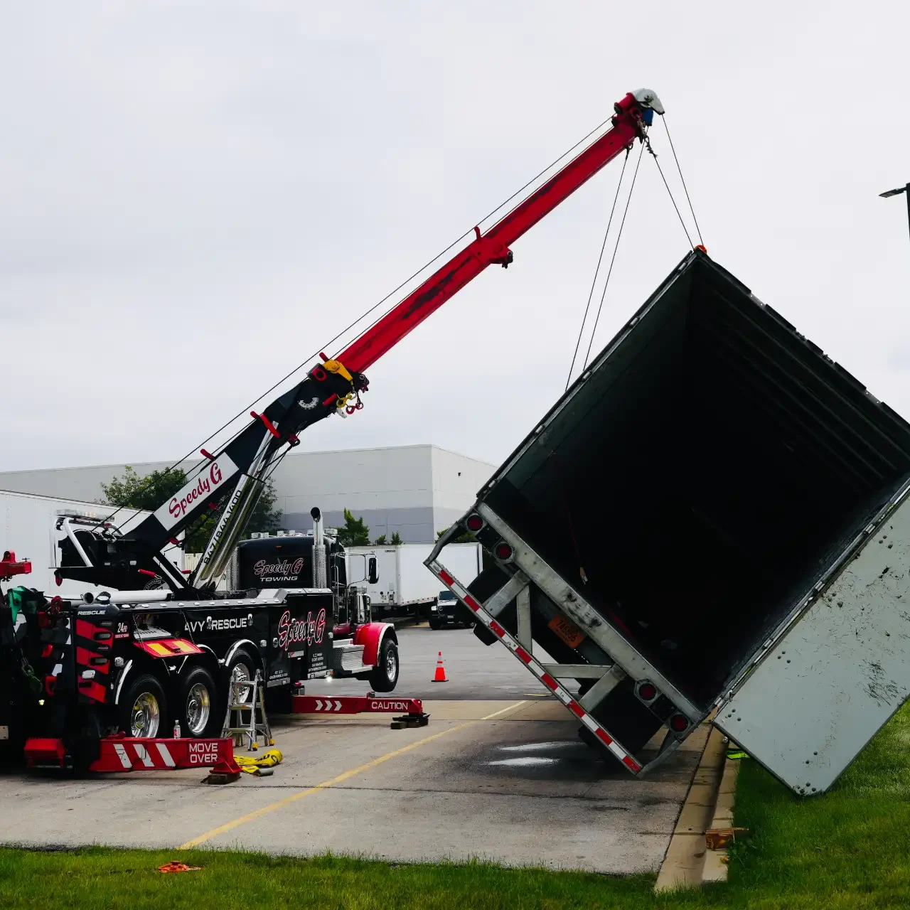 heavy-duty-rotator-truck-uprighting-overturned-semi-trailer